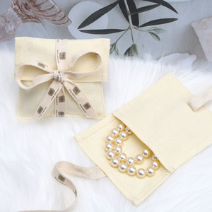 OEM/ODM Organic Cotton Canvas <b>Envelope</b> Bag Custom Logo Screen Printed Rings Bracelet <b>Gift</b> Cotton Dust Pouch with Bow - Product Image 3