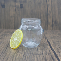 Pots de miel en verre transparent de 580ml avec bouchons en métal joint hermétique en verre pour le stockage des aliments de confiture de miel cru