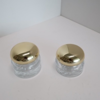 Pot de crème cosmétique en verre écologique de luxe Conception de fond de volcan Nouveau sérum de luxe pour les soins de la peau Crème pour les yeux Caractéristiques Bouteilles en verre