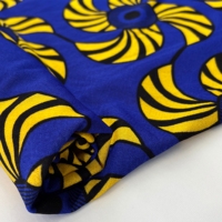 Vente chaude en gros Tissu tricoté extensible en polyester et élasthanne de style africain à imprimé floral pour vêtements et textiles de maison