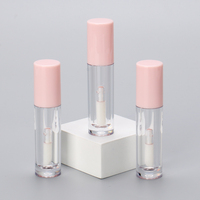 OMI vente en gros tube en plastique brillant rose bouteille de brillant à lèvres vide avec baguette de brosse