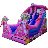 Toboggan gonflable commercial en PVC sur le thème des bonbons roses, toboggan gonflable pour enfants en forme de sucette pour événements extérieurs et locations de fêtes
