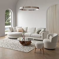 Elegantes, geschwungenes, modulares Sofa mit glatter Oberfläche und schlichtem Design, passend für luxuriöse Wohnräume, runde Chaiselongue-Eckcouch