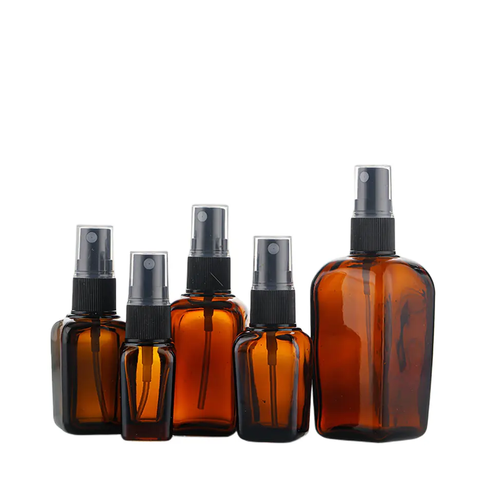 Protected from light portable cosmetic packaging high quality square amber glass essential oil bottle with spray
