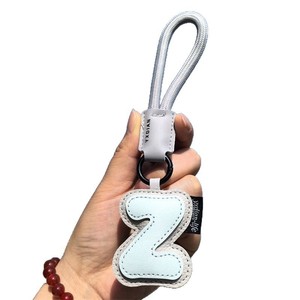 Accesorios para <span class=keywords><strong>bolsos</strong></span>, bolso relleno de PU, dijes para amigos, amantes, regalos de letras escolares, cuerda de nailon, llavero colgante de decoración de PU - Product Image 5