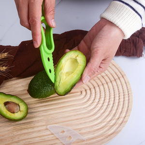 Cortador y Pelador de Aguacates, Herramienta Multifuncional para Separar Frutas Verdes - Product Image 2