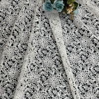 Tissu brodé floral de fabricant d'usine, tissu ajouré avec dentelle brodée pour la mode africaine du soir