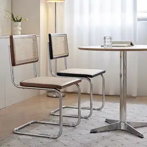 Chaise de salle à manger vintage en bois et rotin avec cadre en métal et pieds en acier inoxydable