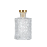 Vase en verre aromatique rond en relief de luxe de 200ml pour bouteille de diffuseur de roseaux dans divers styles pour la décoration de la maison
