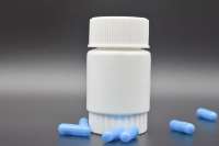 Flacon de pilules rond blanc HDPE de 60ml-Logo personnalisé et couleur pour emballage de capsule de comprimé pharmaceutique (OEM)