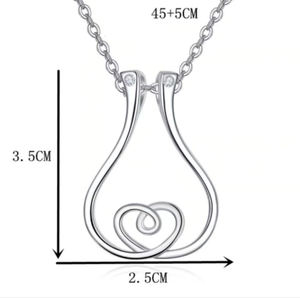 <span class=keywords><strong>สร้อย</strong></span>คอแฟชั่น<span class=keywords><strong>ส</strong></span>ุด<span class=keywords><strong>ส</strong></span>ร้าง<span class=keywords><strong>ส</strong></span>รรค์ทำจากส<span class=keywords><strong>แตน</strong></span><span class=keywords><strong>เล</strong></span><span class=keywords><strong>ส</strong></span>รูปทรงขวดน้ำแบบกลวง<span class=keywords><strong>สร้อย</strong></span>คอที่ใ<span class=keywords><strong>ส</strong></span>่รูปหัวใจสำหรับผู้หญิง - Product Image 2