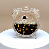 Beliebte niedliche kreative Schwarz gold Astronaut Wecker Schlüssel bund Acryl öl fließende Sand flasche Auto Zubehör Desktop Ornament
