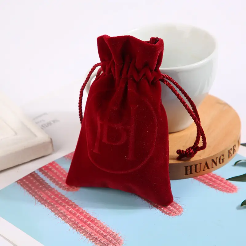 Fábrica al por mayor de moda logotipo impreso personalizado tela de gamuza bolsa de embalaje de joyería pequeña bolsa de terciopelo de regalo con cordón