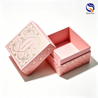 Boîte d'emballage de luxe personnalisée en mousse rose pour flacon de parfum et huile essentielle