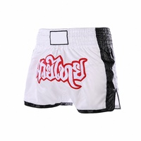Thai-Schriftstickerei Muay Thai Shorts, Goldstreifen-Seitenpanel Polyester Boxershorts, Breiter Bund Ringausrüstung OEM Großhandel