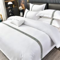 Ensemble de literie de luxe avec sangles brodées, 4 pièces, housse de couette blanche pure pour hôtel 5 étoiles, vente en gros