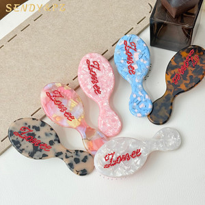 Peigne à coussin d'air en acétate 14*6cm avec <span class=keywords><strong>lettres</strong></span> incrustées de diamants, mignon et portable, peigne de massage à air, outils de coiffure personnalisés - Product Image 1