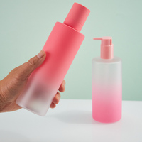 Botellas cilíndricas de PET esmerilado rosa degradado de 450 ml con tapa dispensadora para gel de baño, loción de manos, mascarilla facial y empaque de pelucas