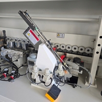 Machine à bordurer automatique CNC RG550S pour la fabrication de portes d'armoires, machine à bordurer pour le bois, les meubles et les panneaux de fibres.