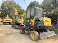 Vente flash : Excavatrice Hyundai R60W-7 d'occasion, 6 tonnes, moteur et pompe Hyundai d'origine, sur roues, Corée