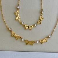 Ensemble collier et bracelet tendance pour femme avec nœud papillon et zircon - Acier inoxydable plaqué or 18 carats, résistant à l'eau et inaltérable, cadeau idéal pour les fêtes