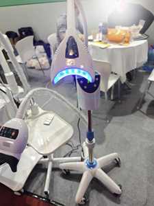 Sistema de Blanqueamiento Dental de 65W con 8 LED de Luz Azul, Gafas para Uso Odontológico, Blanqueamiento Dental Eficiente y Seguro, Precio al por Mayor/OEM - Product Image 5
