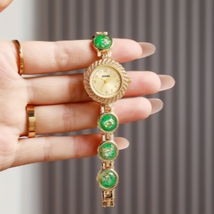 Montre à quartz ronde pour femme avec bracelet en acier, chaîne raffinée et chiffres arabes N2606071 - Product Image 1