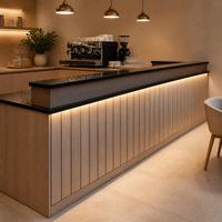 Comptoir de bar en bois avec façade cannelée illuminée et espace de service café pour restaurant, hôtel, salon