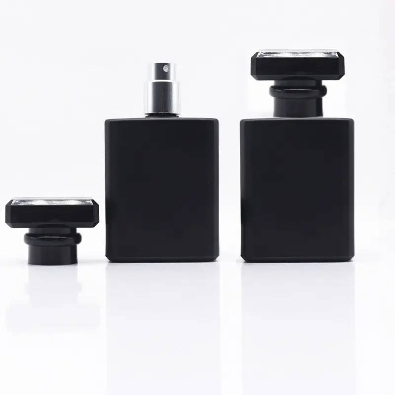 Bottiglia all'ingrosso di profumi in vetro nero trasparente da 30ml 50ml/confezione cosmetica di profumo