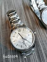 Nouvelle montre à quartz tendance pour couple, style simple et élégant, avec cadran de 40 mm, boîtier en alliage, fenêtre de cadran en verre, affichage par aiguilles