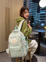 Nouveauté Sac à dos esthétique grande capacité Design unique Sac d'école mignon motif macaron Fermeture éclair Multiples poches Unisexe