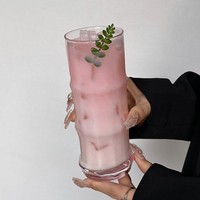 Mat glazen melkbeker, sapbeker, fruitthee- of cocktailbeker met matte textuur, modern, eenvoudig design, enkelwandig, zonder handvat en zonder deksel.