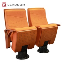 Siège pliant Leadcom LS-21601 élégant avec base à piétement unique et coque en bois massif pour salles de conférence, théâtres et auditoriums