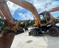 Excavatrice sur pneus Hyundai R210W d'occasion d'origine coréenne, 9 roues, bien entretenue, 21 tonnes, hydraulique