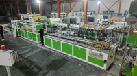 Ligne d'extrusion à double vis BOGDA contrôlée par PLC pour la fabrication de panneaux muraux rainurés en PVC WPC