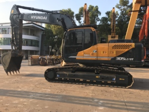 Excavatrice sur chenilles Hyundai 305LC 9T jaune, hydraulique, pour travaux de construction, machine lourde sur chenilles - Product Image 1