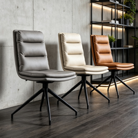 Chaise de salle à manger moderne nordique de luxe léger avec revêtement en cuir, structure pivotante en métal et panneau de fibres à densité moyenne pour la maison