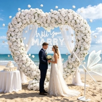 Arche florale en forme de cœur en roses de soie résistantes aux UV avec base stable pour demande en mariage romantique en extérieur destinée aux organisateurs de mariages