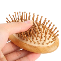Brosse à cheveux en bois écologique compacte avec coussin d'air, démêlante et massante