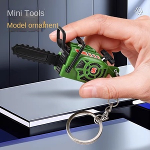 Llavero de <span class=keywords><strong>motosierra</strong></span> en miniatura de plástico, divertido modelo de cortacésped, con cuerda de tracción y sonido, para broma creativa, pequeño colgante para bolso - Product Image 4