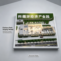 Maquette d'usine de parc industriel avec immeuble de bureaux, atelier, zone de stationnement, routes et ceinture verte