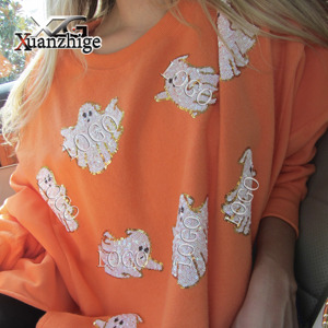 XuanZhiGe di alta qualità morbido e accogliente tessuto <span class=keywords><strong>oversize</strong></span> girocollo con paillettes ricamo personalizzato logo <span class=keywords><strong>arancione</strong></span> fantasma Patch <span class=keywords><strong>felpa</strong></span> - Product Image 1