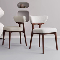 Chaises de salle à manger modernes nordiques noires en bois de caoutchouc rembourré pour restaurant café hôtel