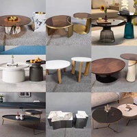 Salon italien de luxe moderne Table basse de thé centrale en acier inoxydable marbre métal noir doré avec pieds boule