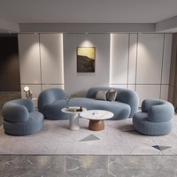 Canapé incurvé en tissu de laine d'agneau de luxe léger, table basse moderne simple, salon, salon de beauté, magasin de vêtements, populaire sur Internet
