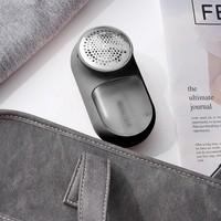Rasoir électrique portable HG pour enlever les peluches en tissu et laine, rechargeable par USB, pour enlever les peluches des pulls.