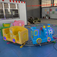 Train électrique sur rail miniature à batterie pour adultes et enfants, idéal pour les parcs d'attractions, les centres commerciaux et les aires de jeux.