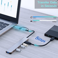Adaptateur hub USB C polyvalent 7-en-1 à double prise avec support de chargeur rapide sans fil pour ordinateur portable et téléphone portable