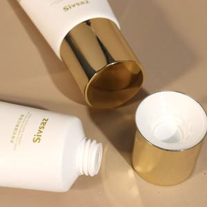 Tube cosmétique blanc avec capuchon électro-plaqué or métallisé pour masque facial peel-off - Product Image 2