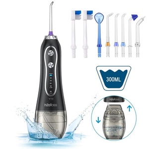 Hydropulseur intelligent sans fil électrique, irrigateur buccal étanche avec 6 têtes de buses et 2 brosses - Product Image 1